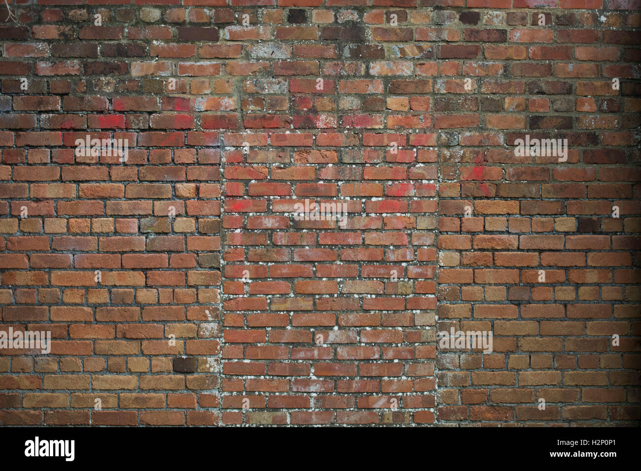A sold red brick wall. Stock Photo