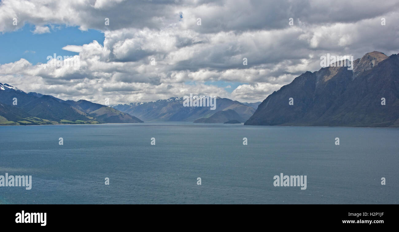 A dramatic view of Lake Hawea on a cloudy day in New Zealand. Stock Photo