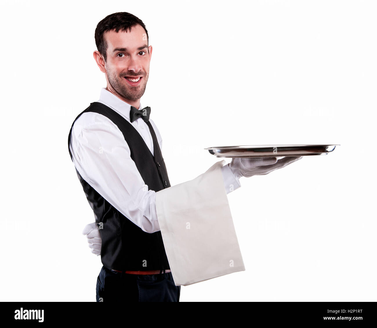 Waiter holding tray. Isolated over white background. Smiling butler