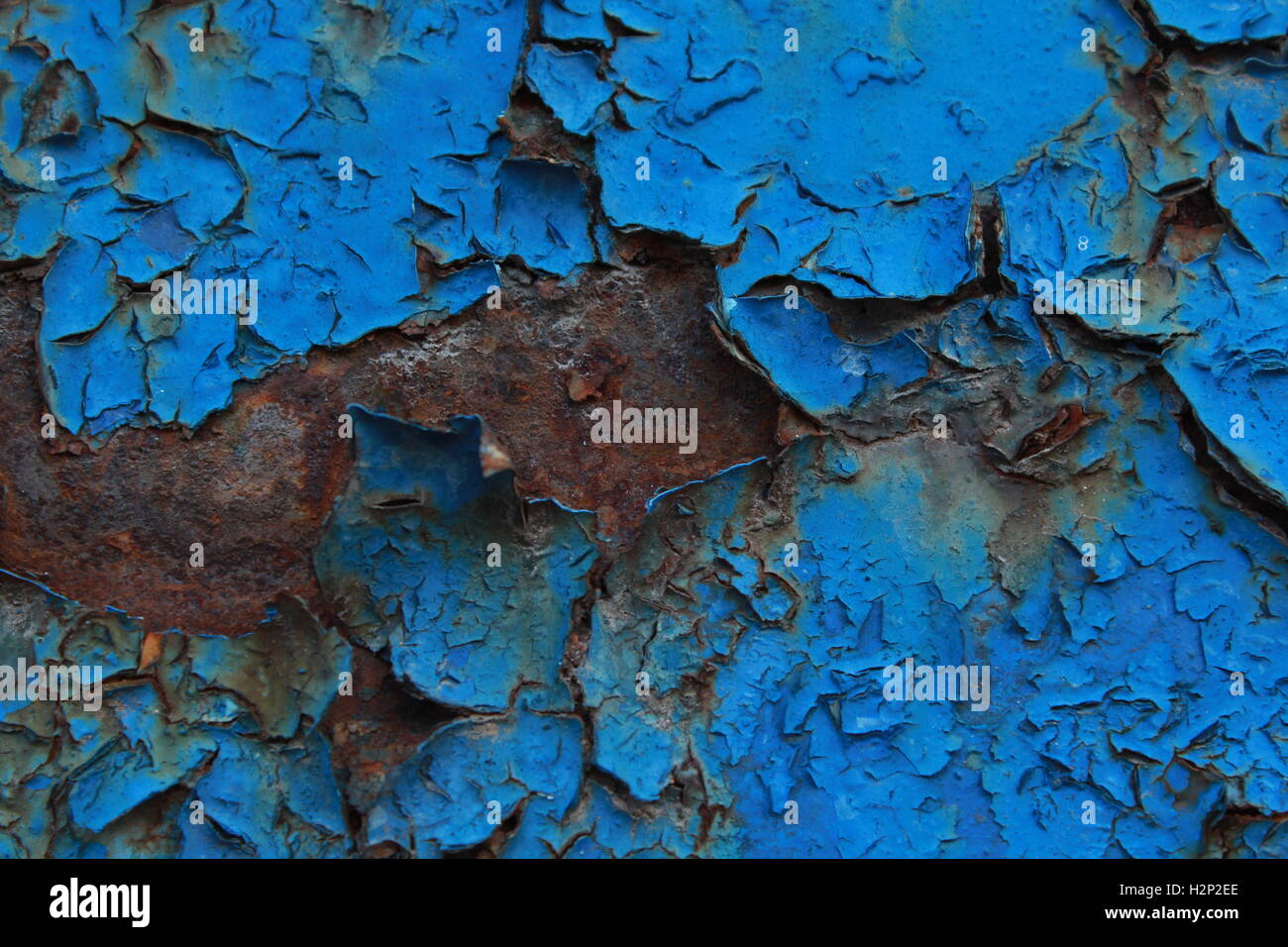 closeup of a rusty board painted blue Stock Photo