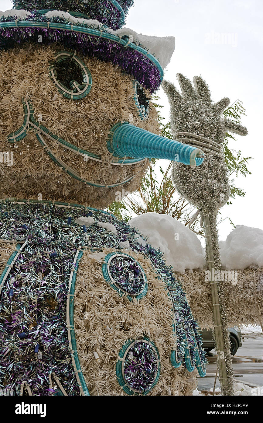 Funny Snowman, made from recycled materials. Stock Photo