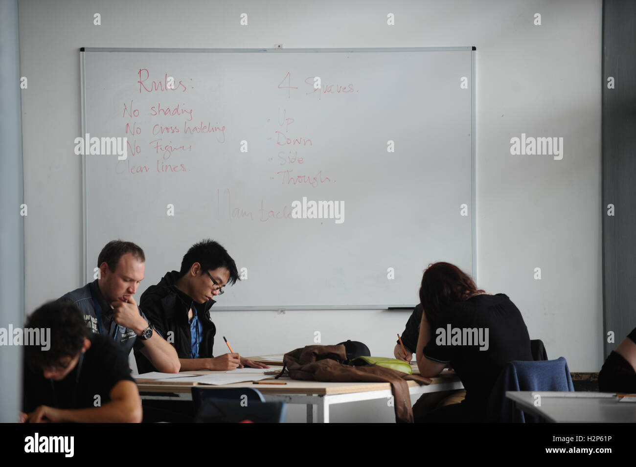 College students get their heads down and work hard on their education