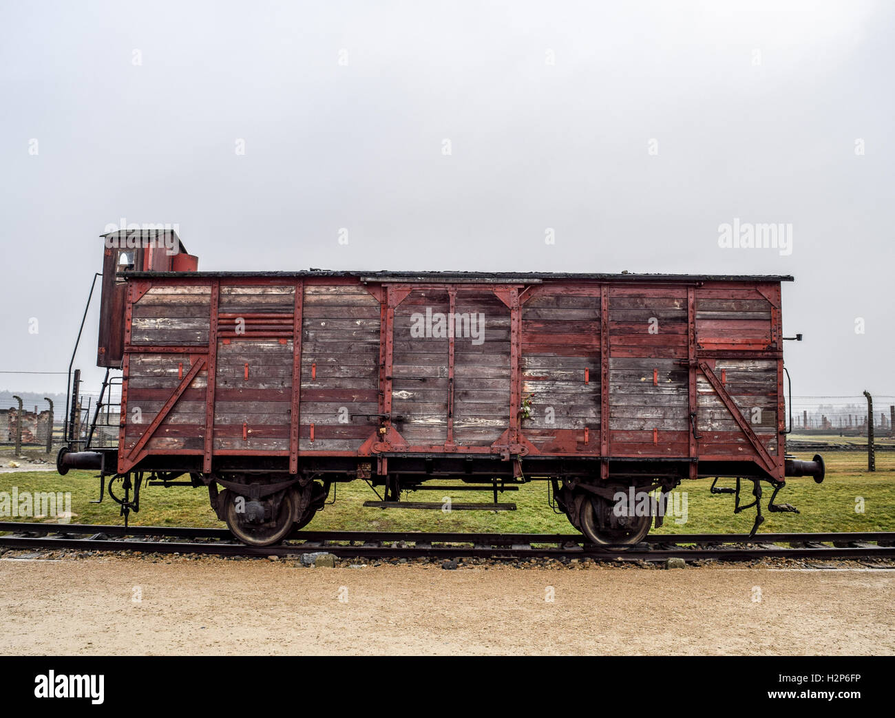 Birkenau Train at tracks in front of concentration camp Stock Photo