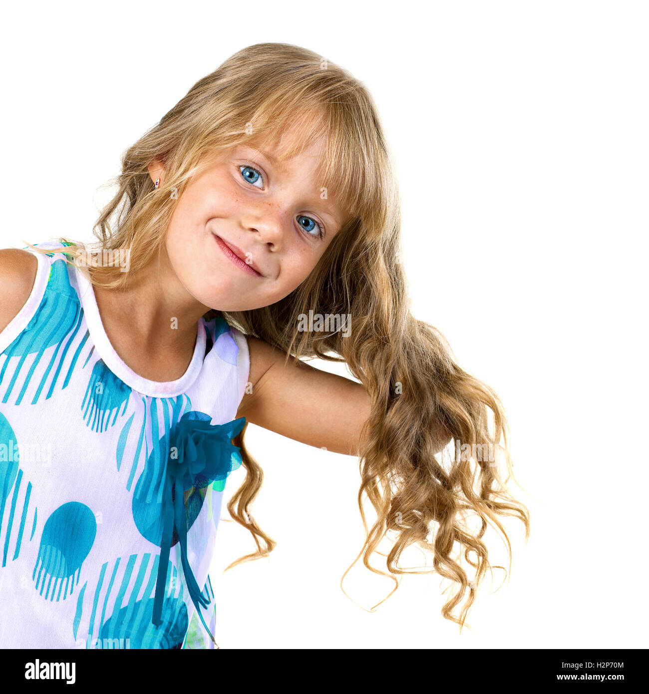Fashion portrait of cute little girl with long curly blond hair. Girl ...