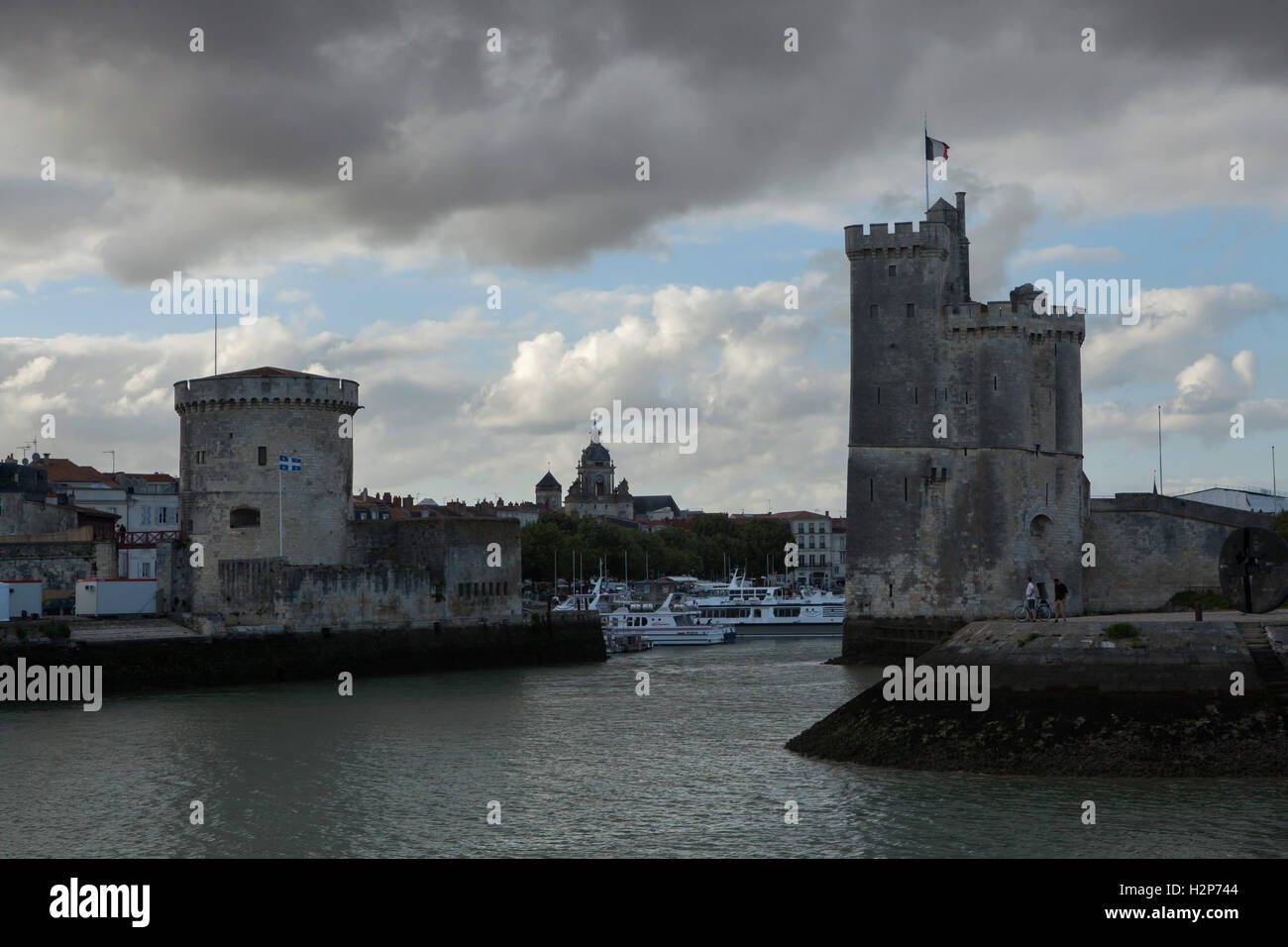 Tour Saint-Nicolas (R) and Tour de la Chaine (L) in the Old Harbour (Vieux Port) in La Rochelle, France. Stock Photo