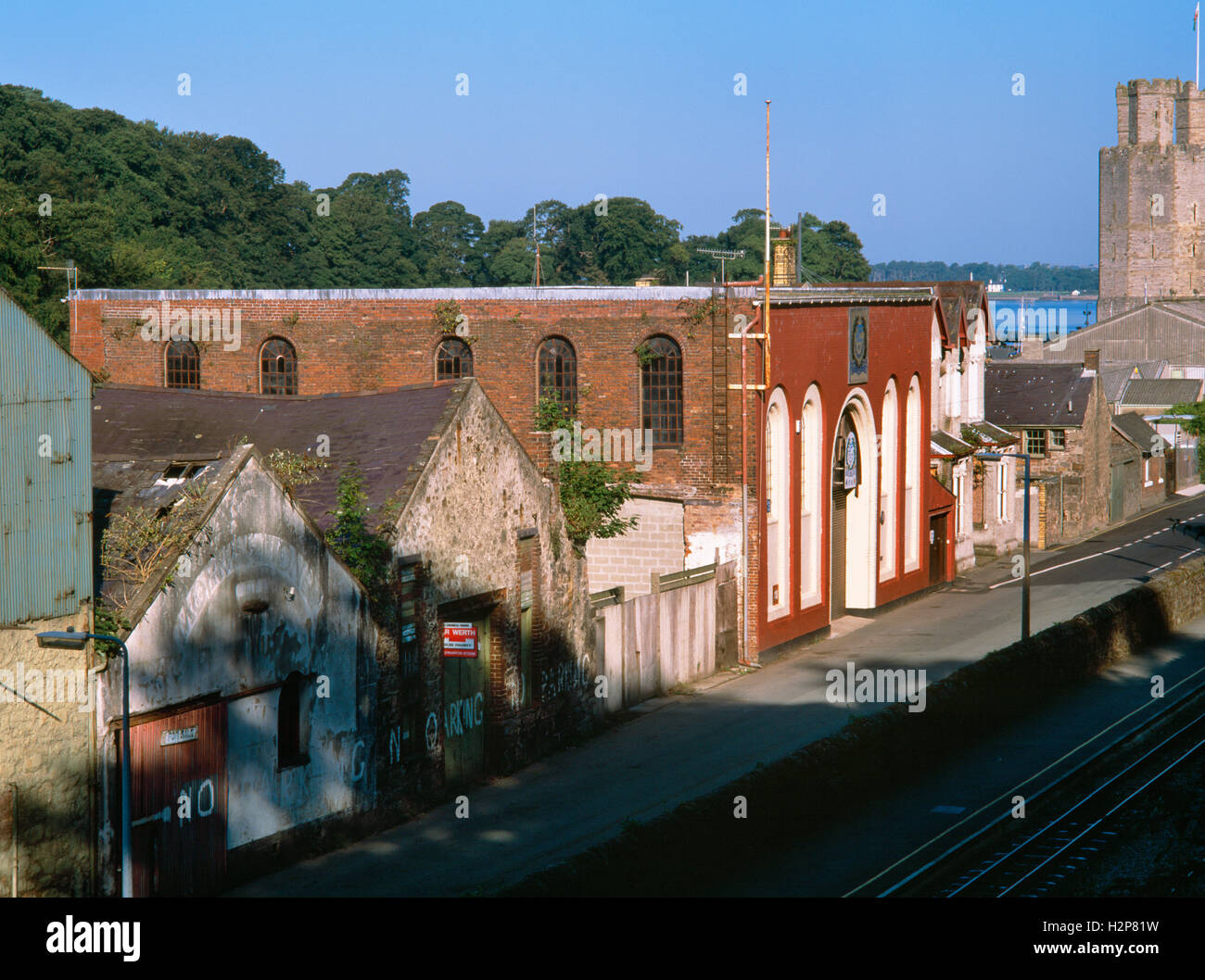 Former DeWinton ironworks foundry (red-brick building), Caernarfon, North Wales. Victorian workshops & offices complex along the Afon Seiont. Stock Photo