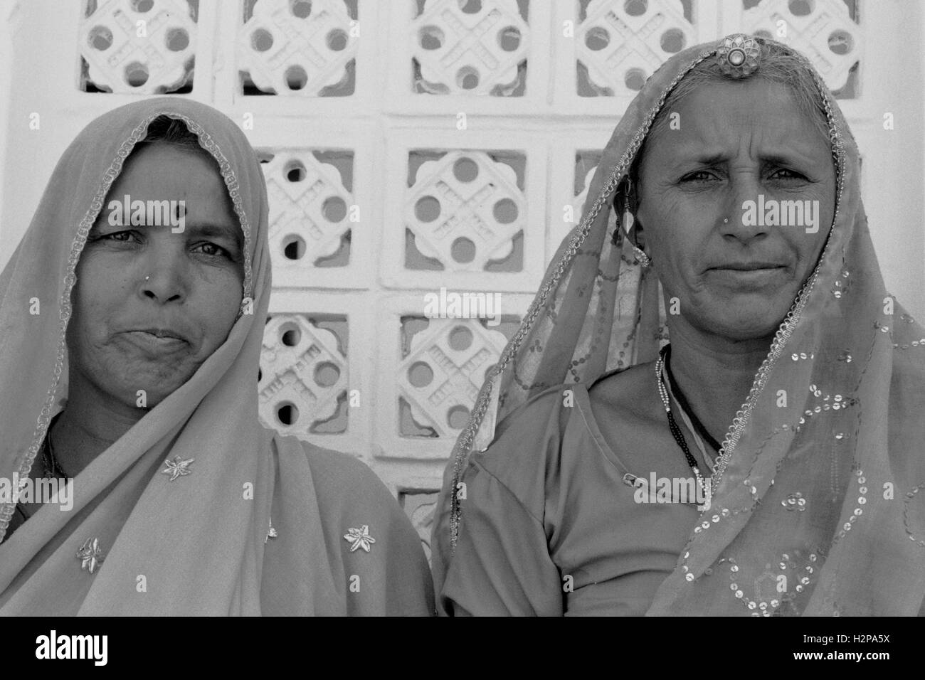 two women india brian mcguire Stock Photo