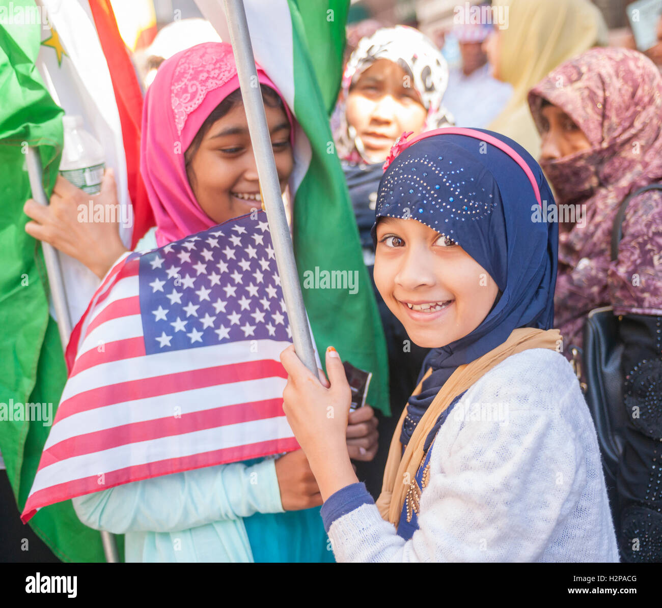 Muslims from the tri-state area gather on Madison Avenue  in New York on Sunday, September 25, 2016 for the American Muslim Parade. The annual parade, now in it's 31st year, celebrates the diversity and heritage of Islamic culture. Participants march down Madison Avenue ending in a street fair. (© Richard B. Levine) Stock Photo