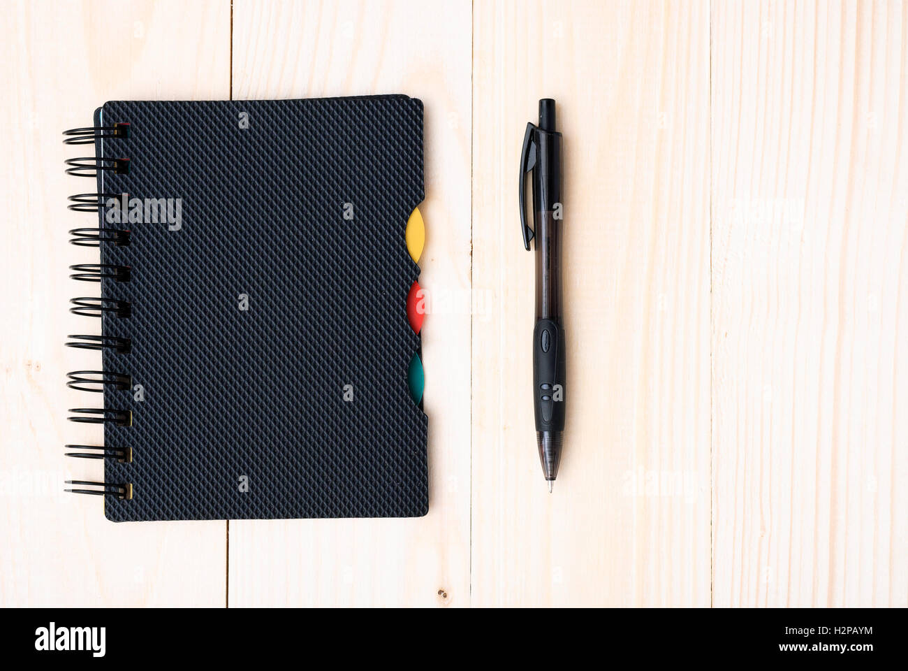 notepad with pen isolated Stock Photo - Alamy