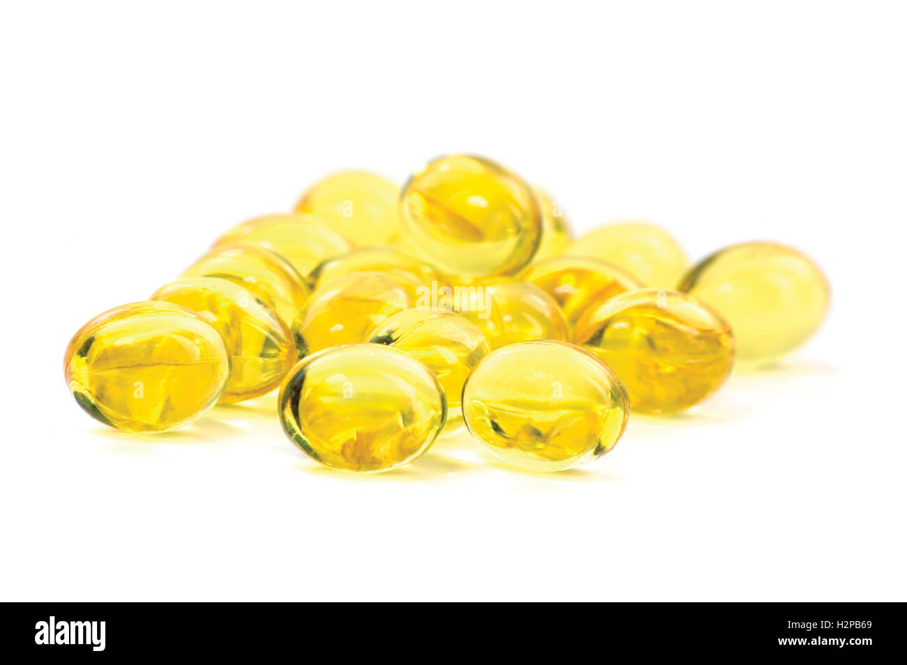 Vitamin oil capsules, yellow, large detailed isolated macro closeup Stock Photo Alamy