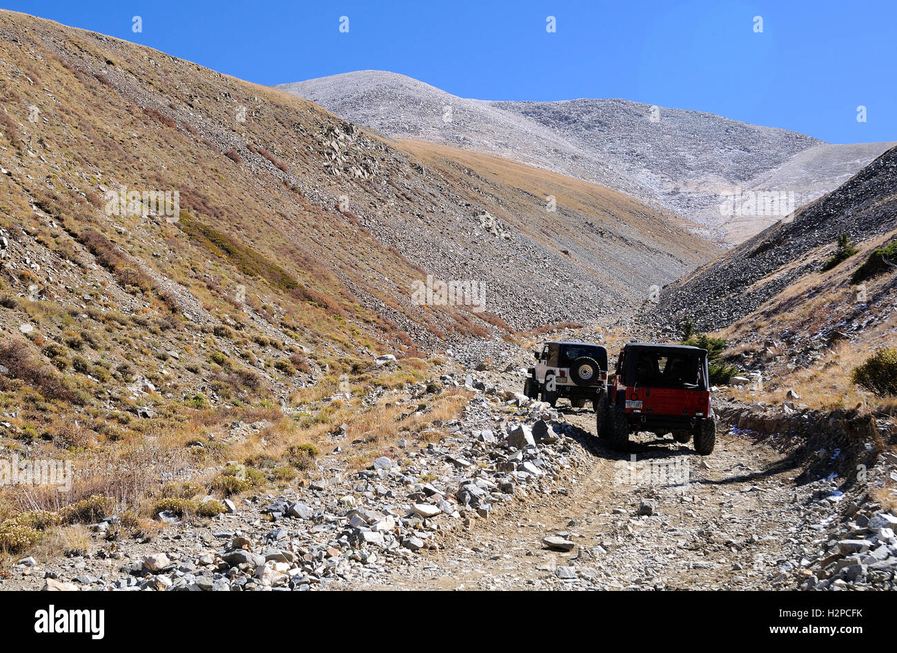 Two Jeeps on a Colorado high country trail in the Rocky Mountains, the Baldwin Gulch Road or road 277 in Chaffee County Stock Photo