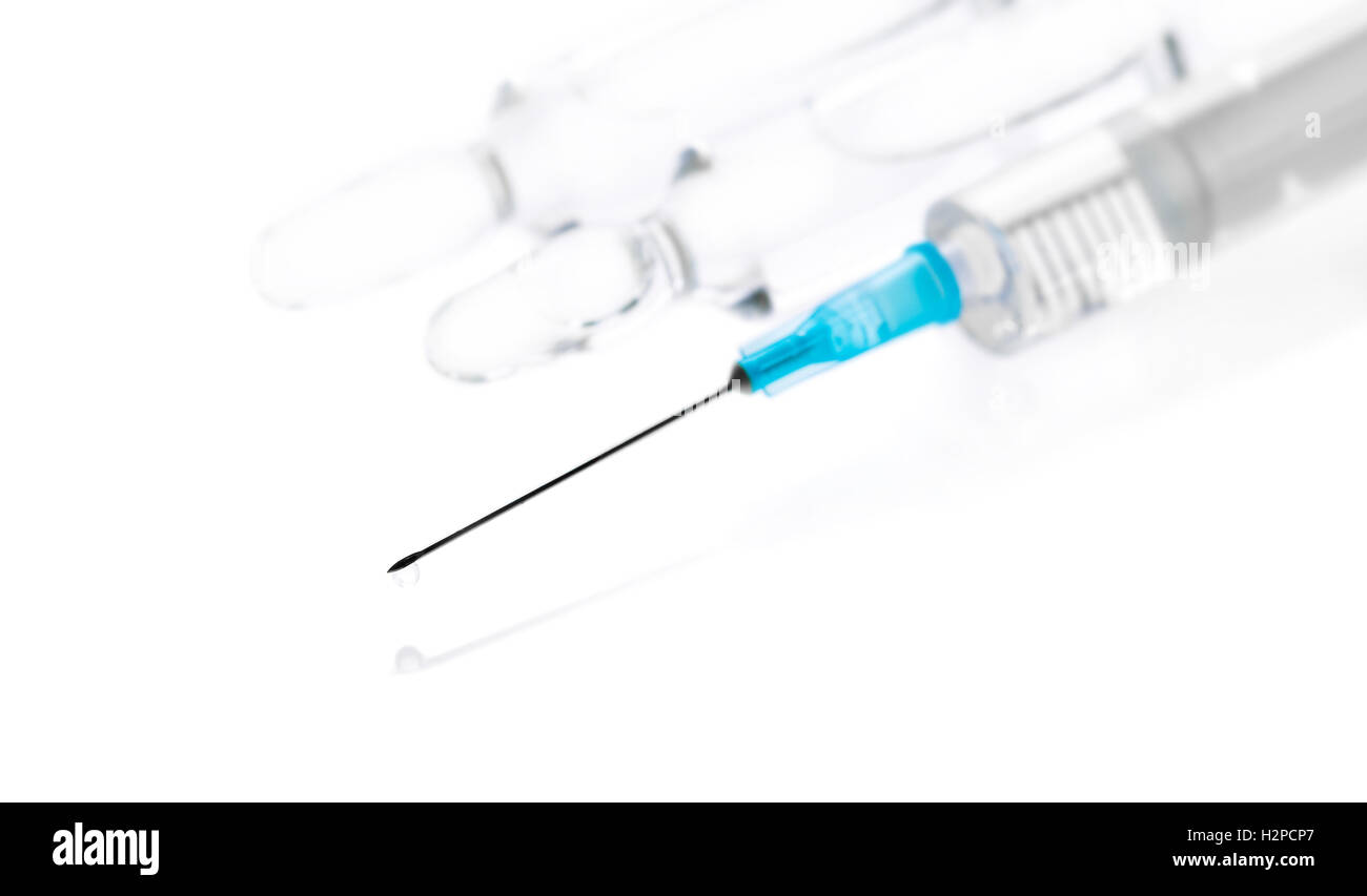 medicament in a glass vial and syringe closeup Stock Photo Alamy
