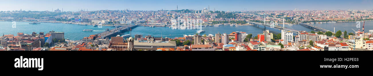 Extra wide panoramic photo of Istanbul, Turkey. Summer cityscape with Golden Horn a major urban waterway and the primary inlet o Stock Photo