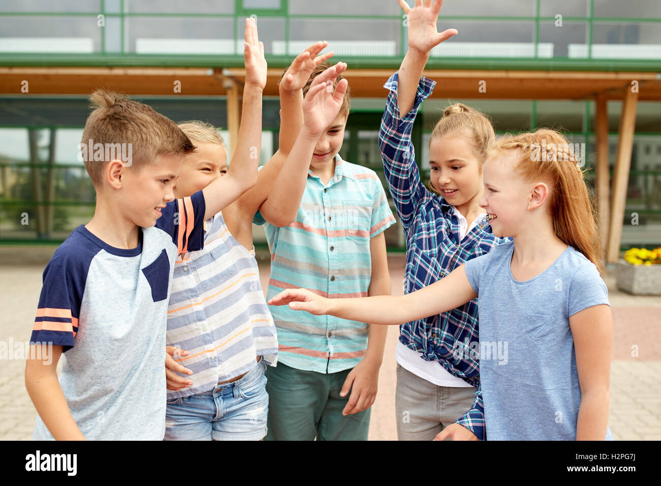 group of happy elementary school students Stock Photo - Alamy