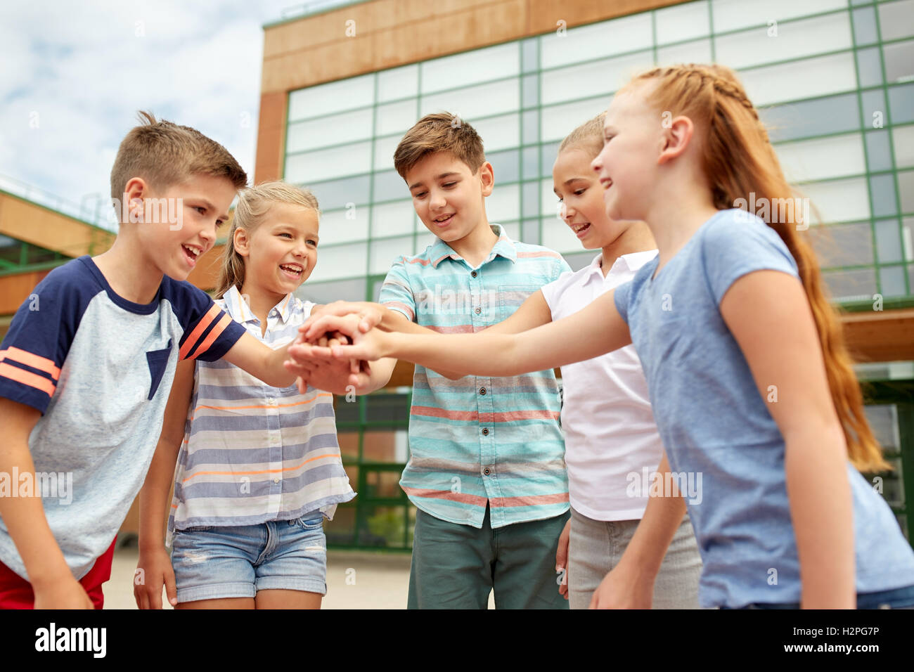 group of happy elementary school students Stock Photo - Alamy