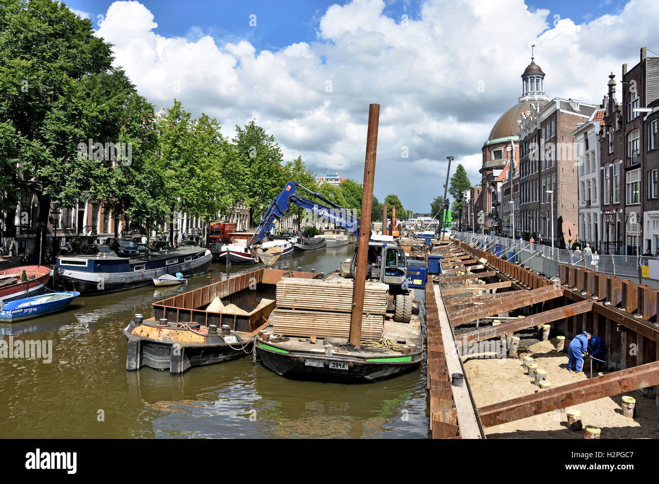 Repair Construction Dike Wall Street Canal on the Singel Amsterdam The Netherlands Stock Photo