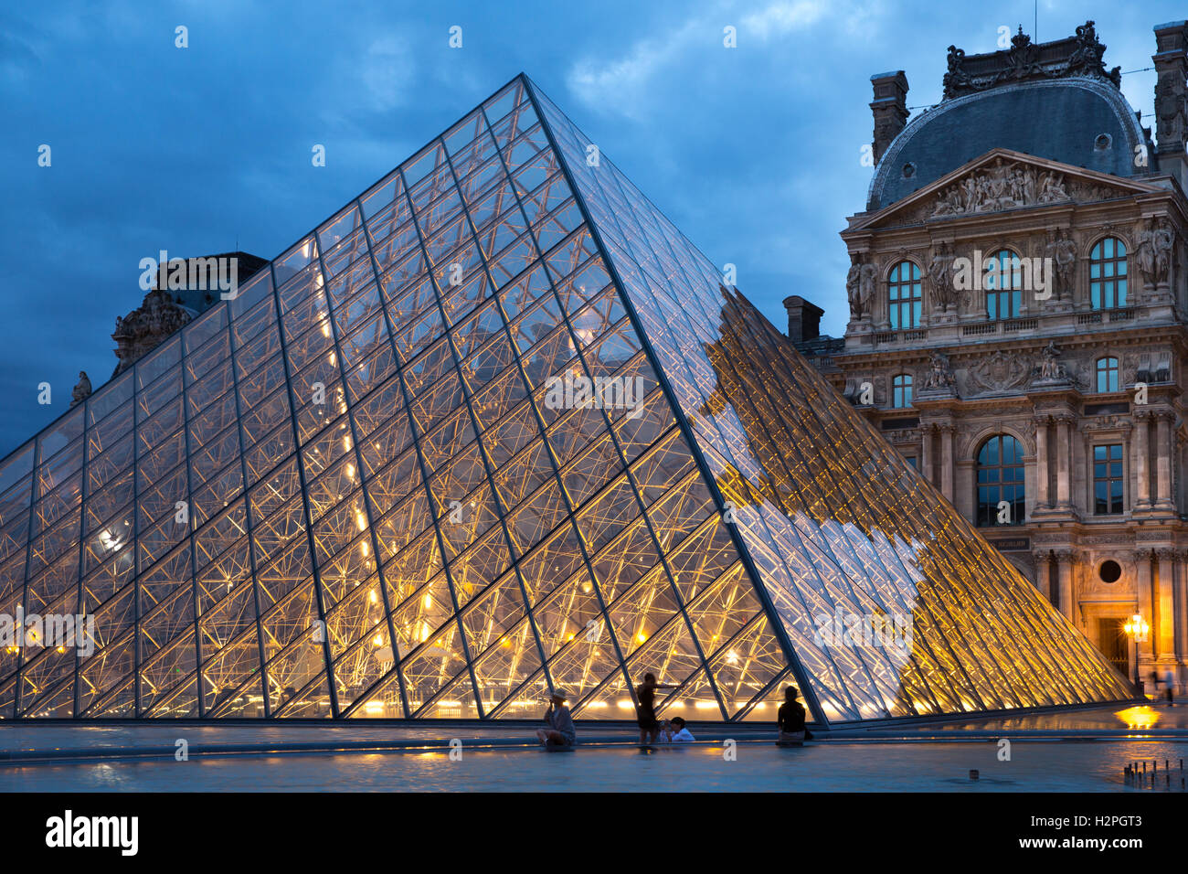 The main (Pyramid) entrance of the Louvre, Paris, France. Stock Photo