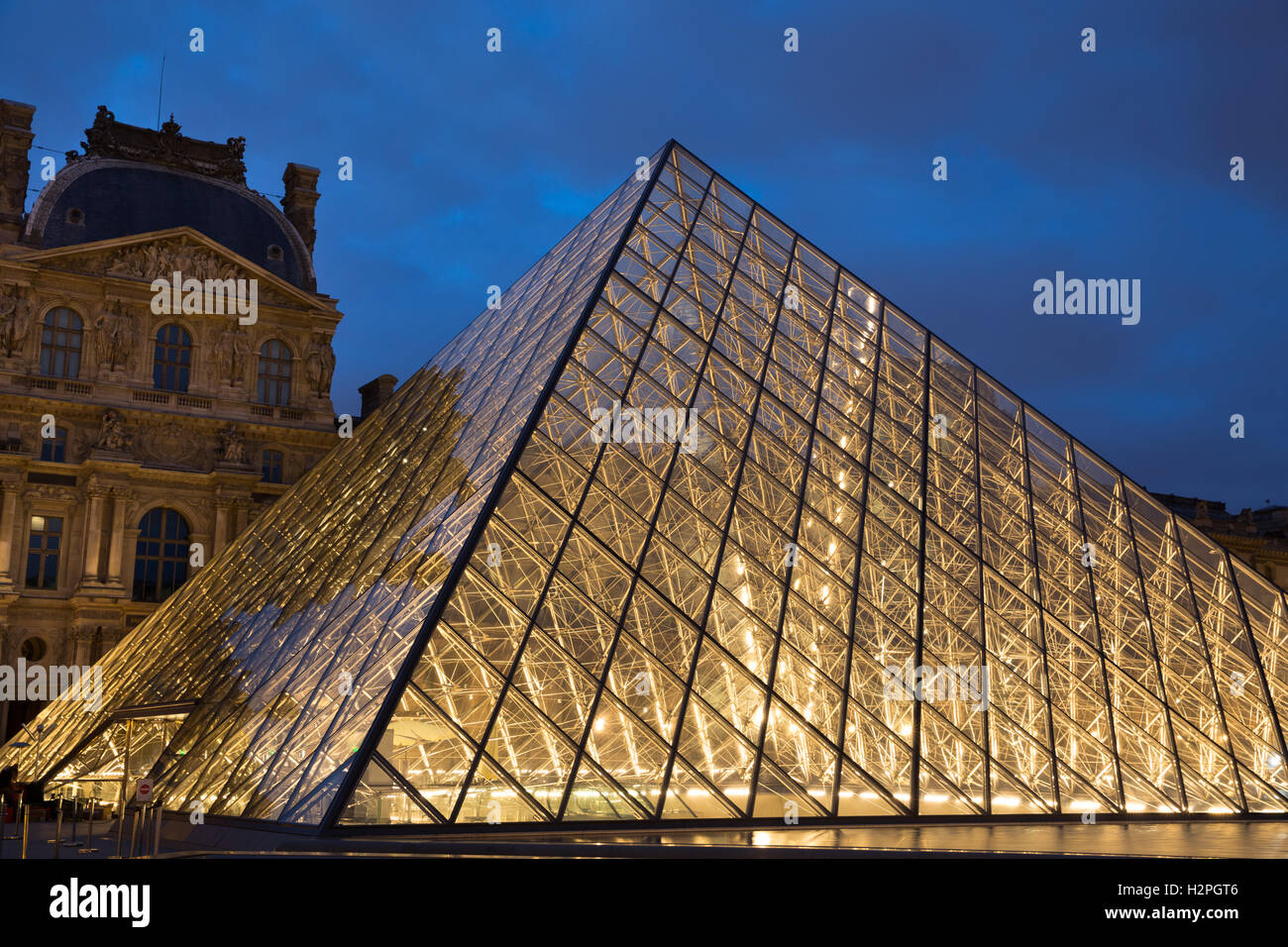 The main (Pyramid) entrance of the Louvre, Paris, France. Stock Photo