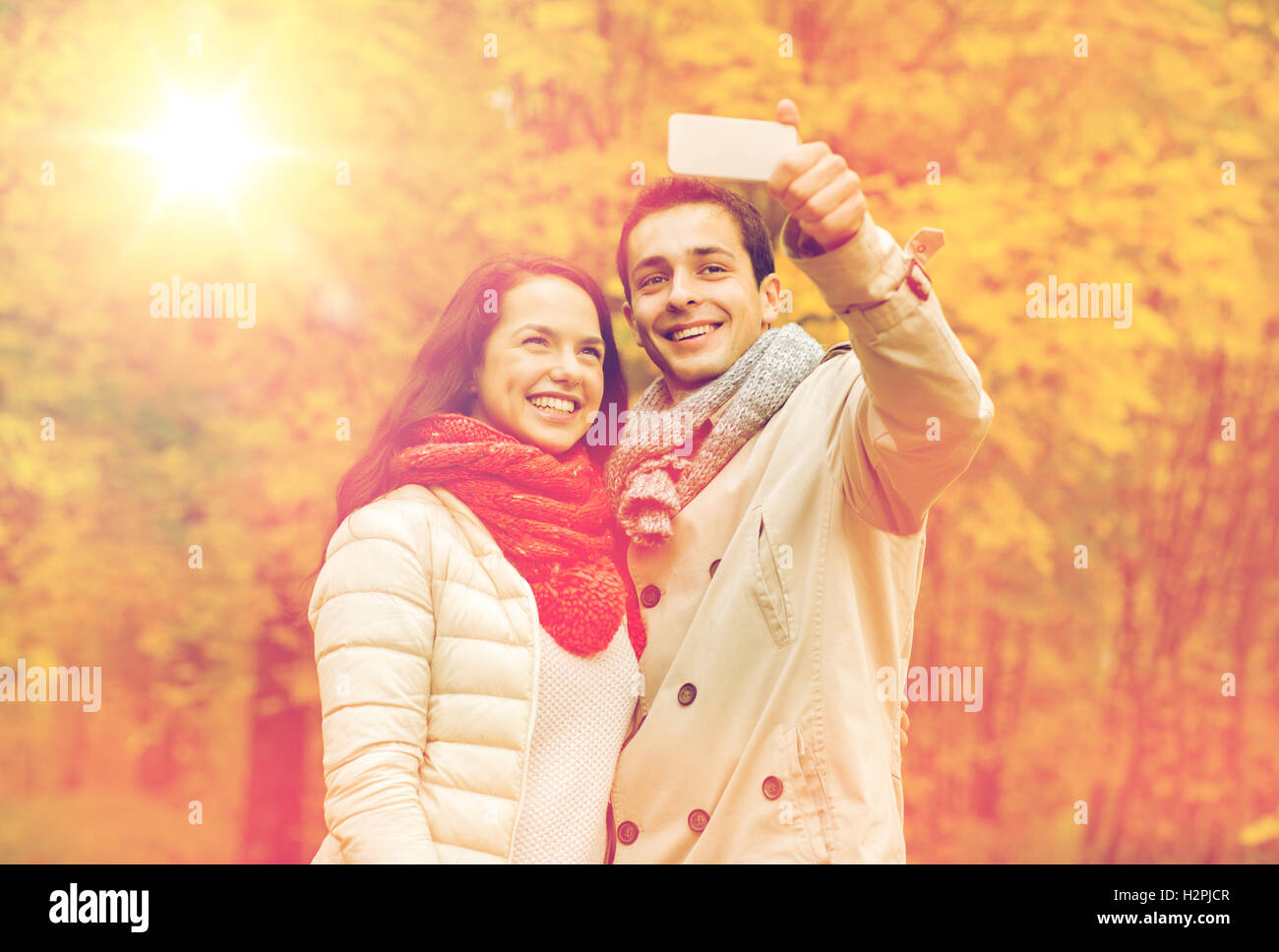 Teenage couple hugging in park hi-res stock photography and images - Alamy