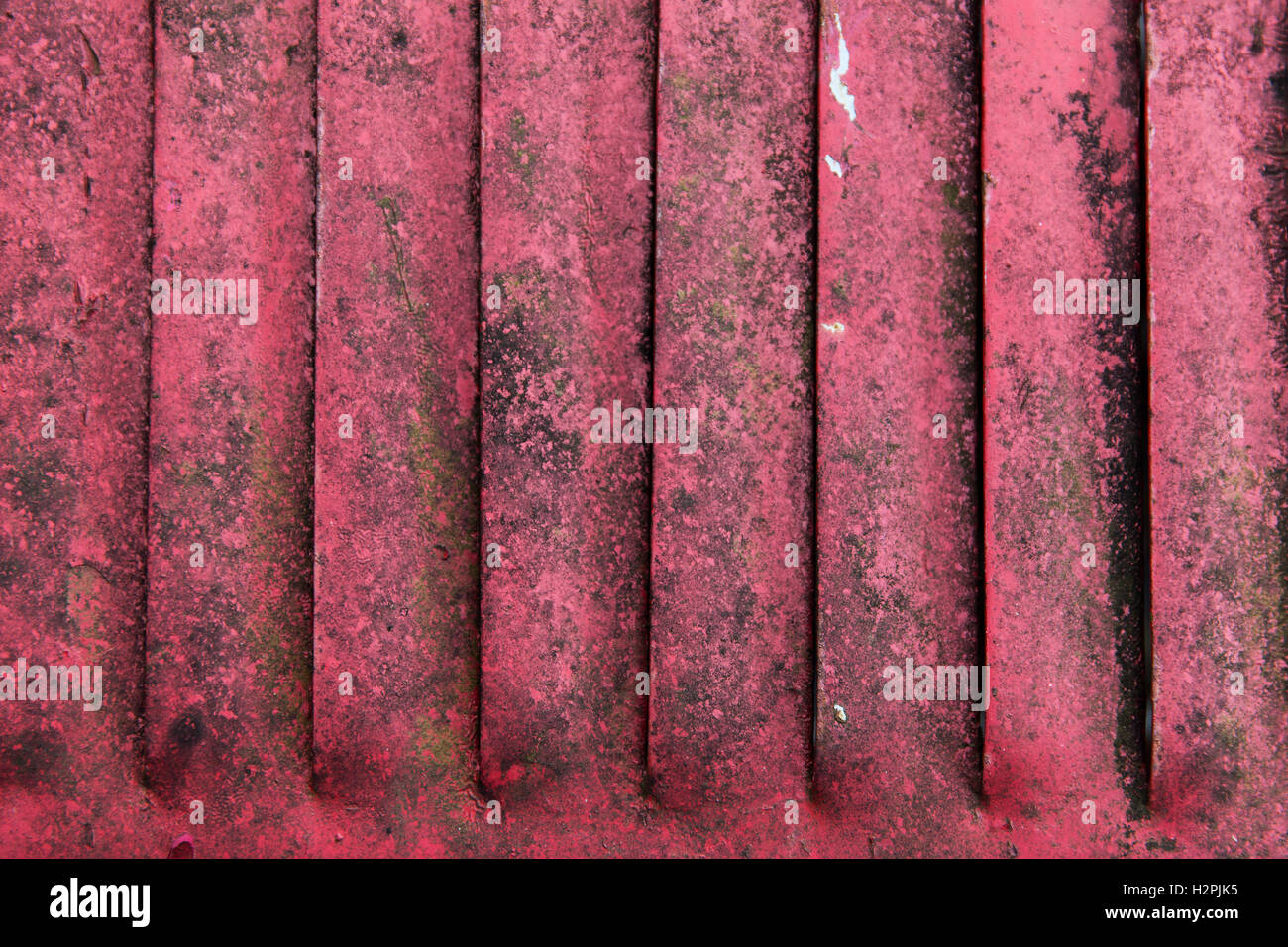 close up of old red rusty metal flaps Stock Photo