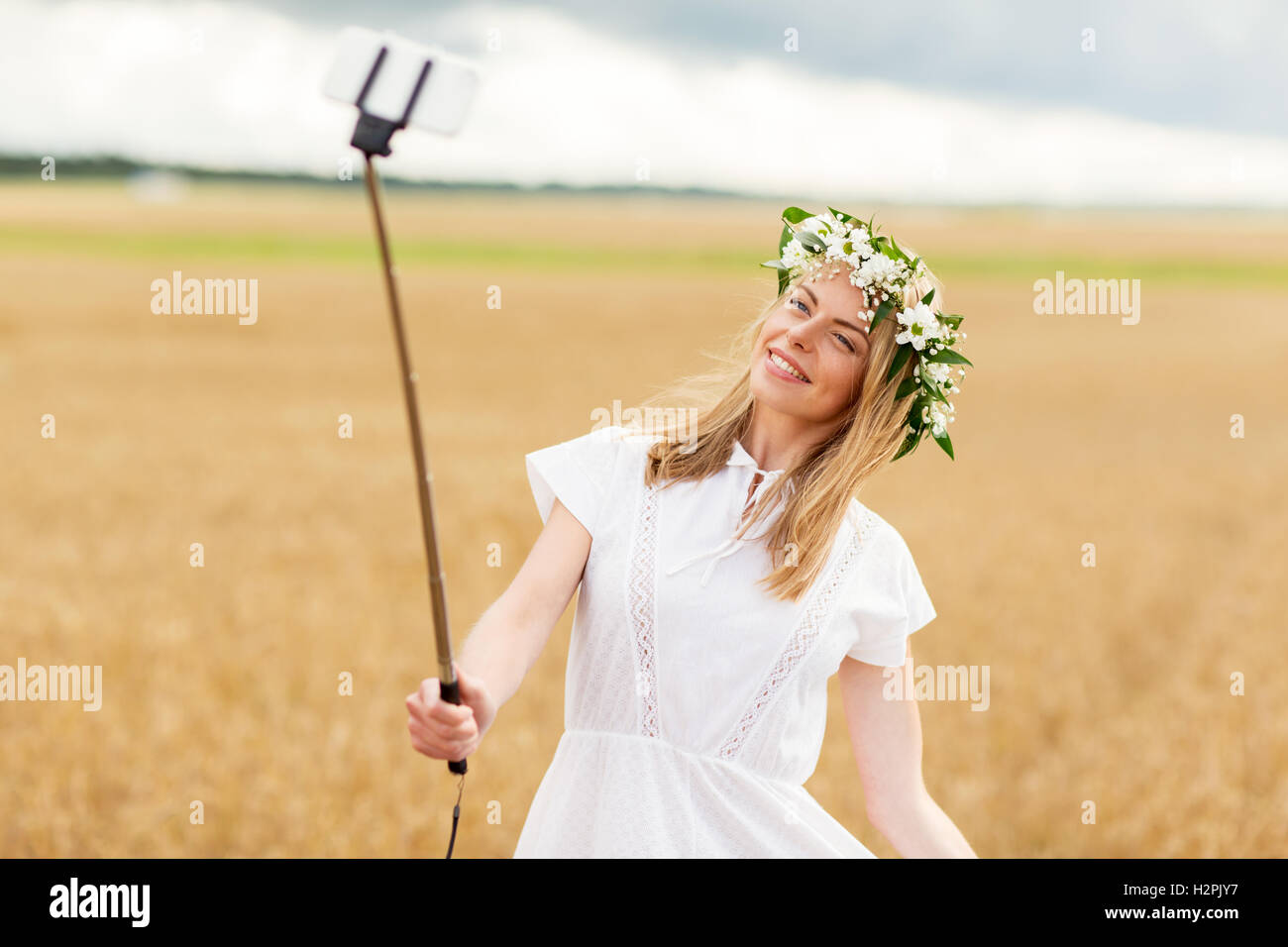 happy young woman taking selfie by smartphone Stock Photo - Alamy