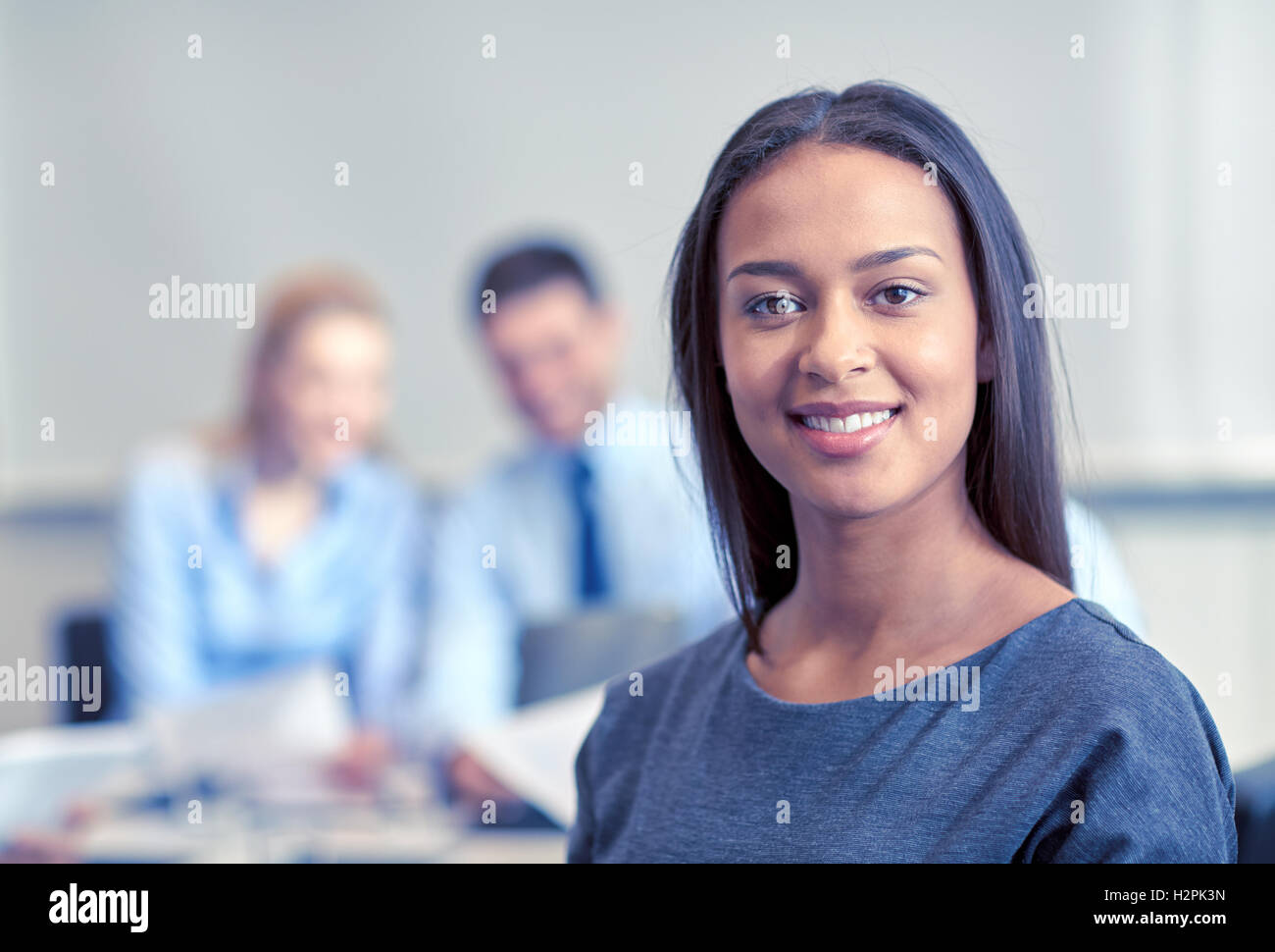 group of smiling businesspeople meeting in office Stock Photo - Alamy