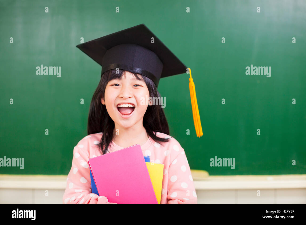happy girl wear a graduation hat with blackboard Stock Photo Alamy