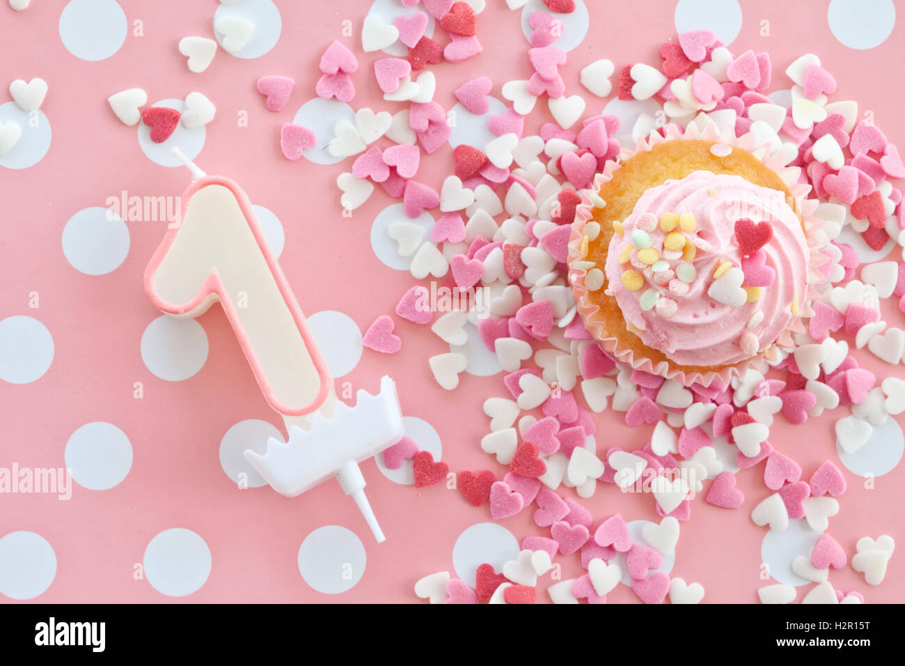 Little cupcake with pink frosting Stock Photo