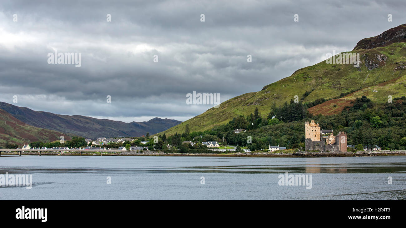 The village Dornie and Eilean Donan Castle in Loch Duich seen from Totaig, Ross and Cromarty, Western Highlands of Scotland, UK Stock Photo