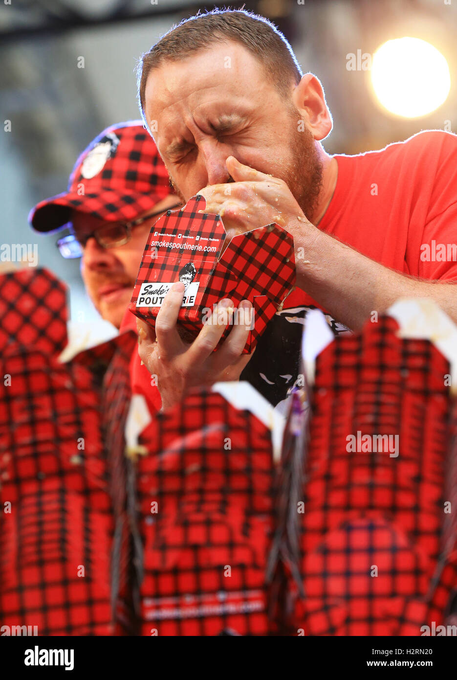 Joey chestnut poutine High Resolution Stock Photography and Images - Alamy