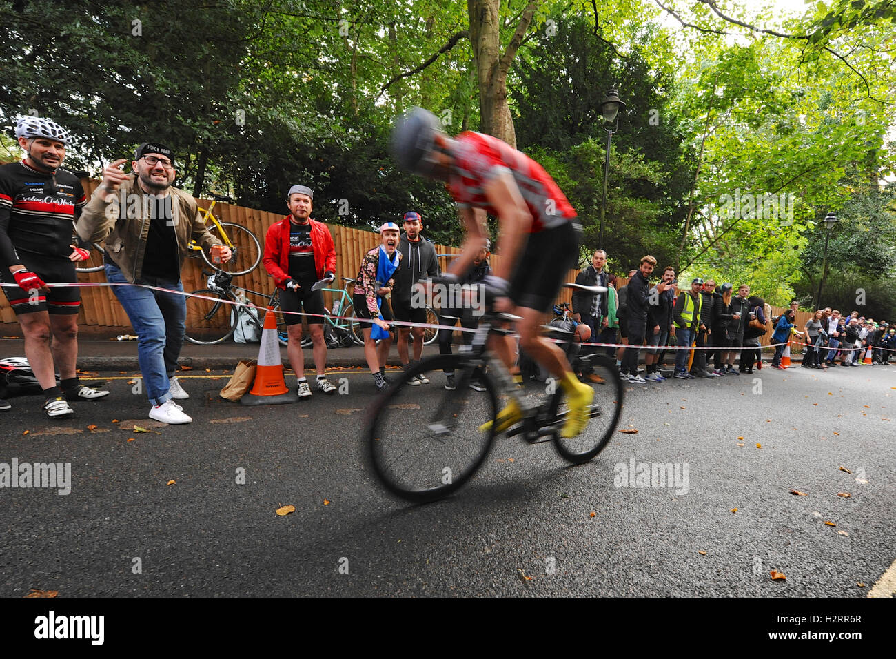 London, UK. 01st Oct, 2016. Crowds at the Rollapaluza Urban Hill Climb competition cheering a rider as he tackles the steepest section of the course.  The event took place on Swain’s Lane, arguably the most famous and notoriously challenging climb in London. . Credit:  Michael Preston/Alamy Live News Stock Photo