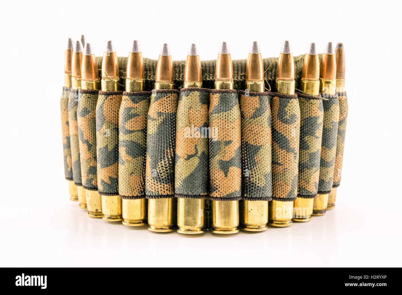 camouflage ammunition belt for rifle on white background Stock Photo