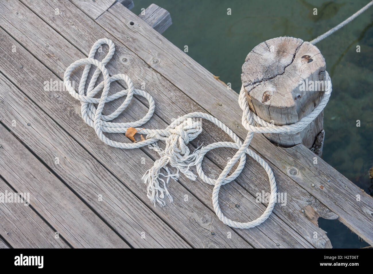 Ropes on the harbor deck in Greece Stock Photo Alamy