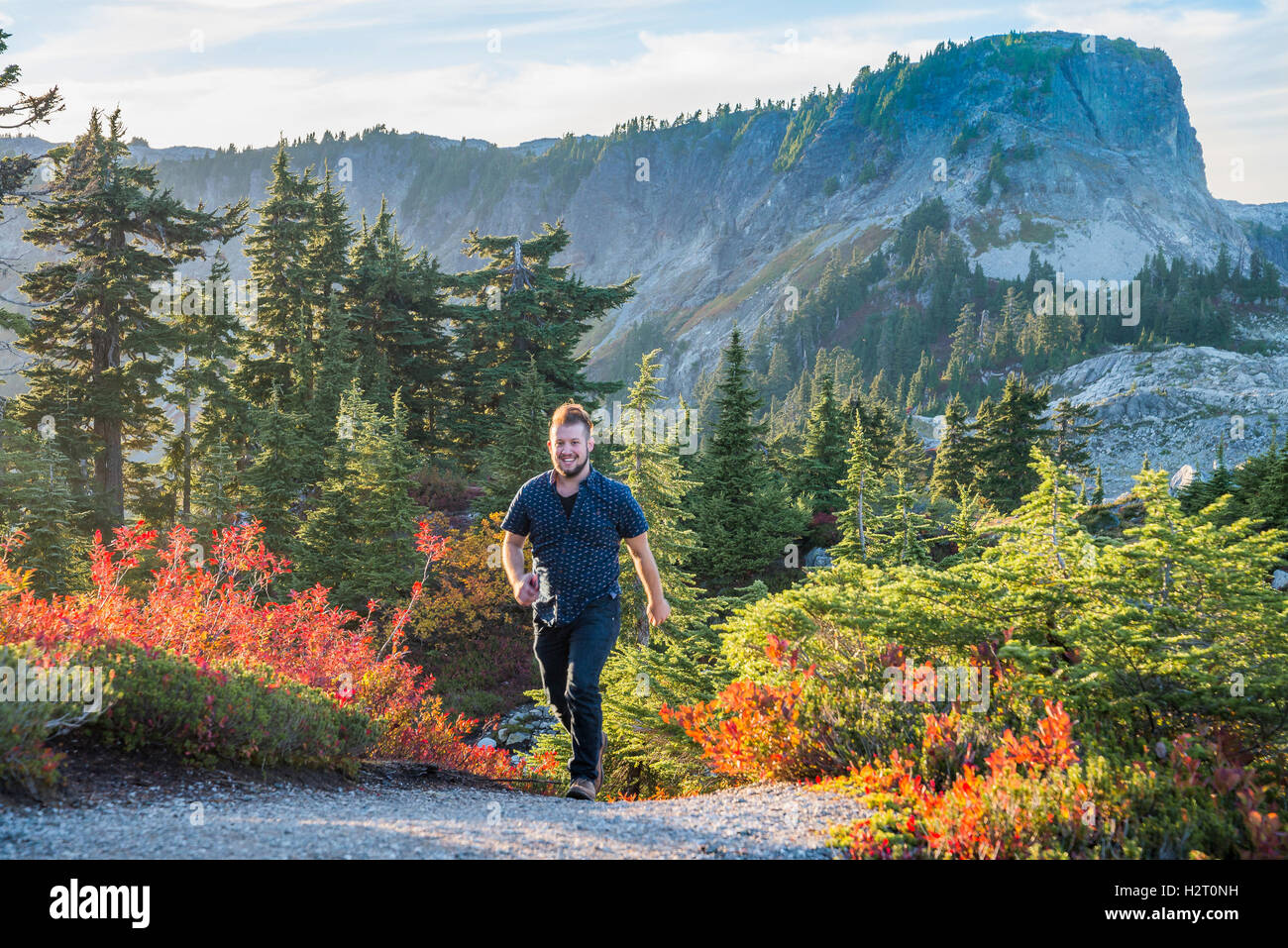 Hiker and Fall colour. Artist Point,  Mt. Baker-Snoqualmie National Forest, Washington State, USA Stock Photo