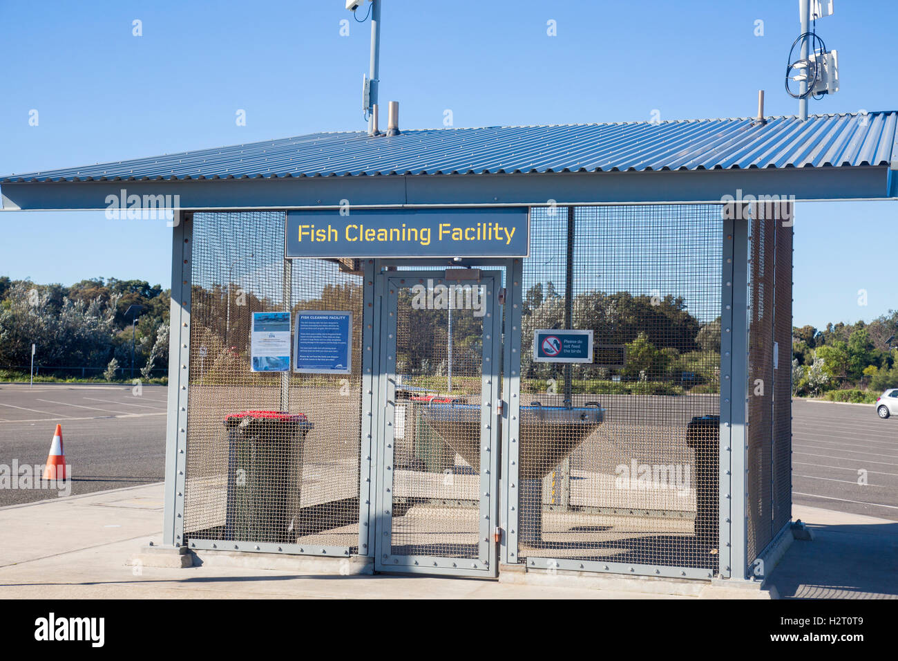 Fish cleaning facility station at Port Botany, Sydney, with mesh walls to stop seagulls stealing the catch,Australia Stock Photo
