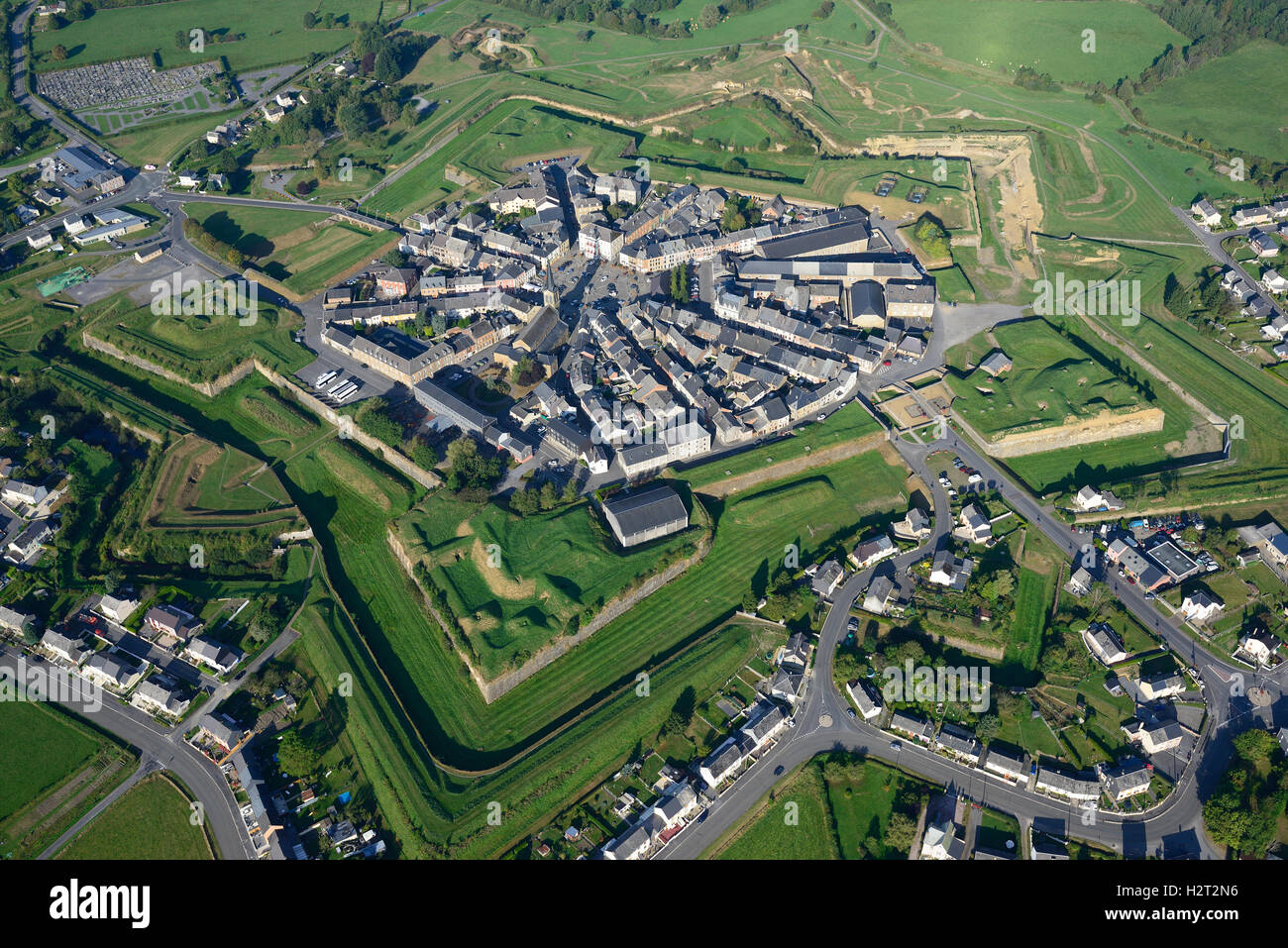 AERIAL VIEW. Star-shaped walled-town of Rocroi. Ardennes, Grand Est, France. Stock Photo