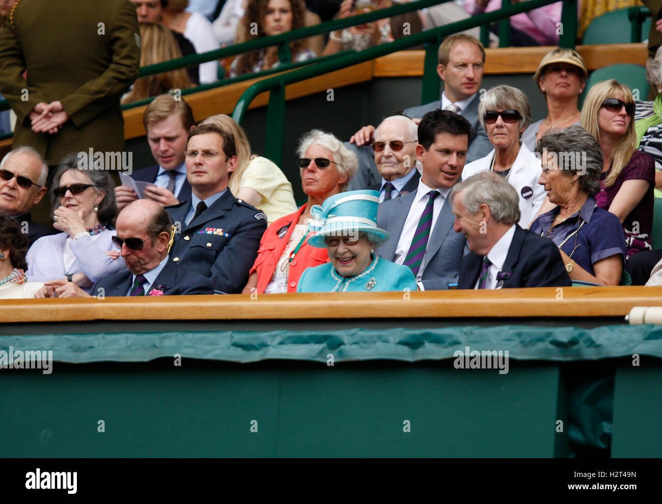 From left to right, Duke of Kent, Queen Elizabeth and club chairman Tim Phillips, behind, Tim Henman and Virginia Wade Stock Photo