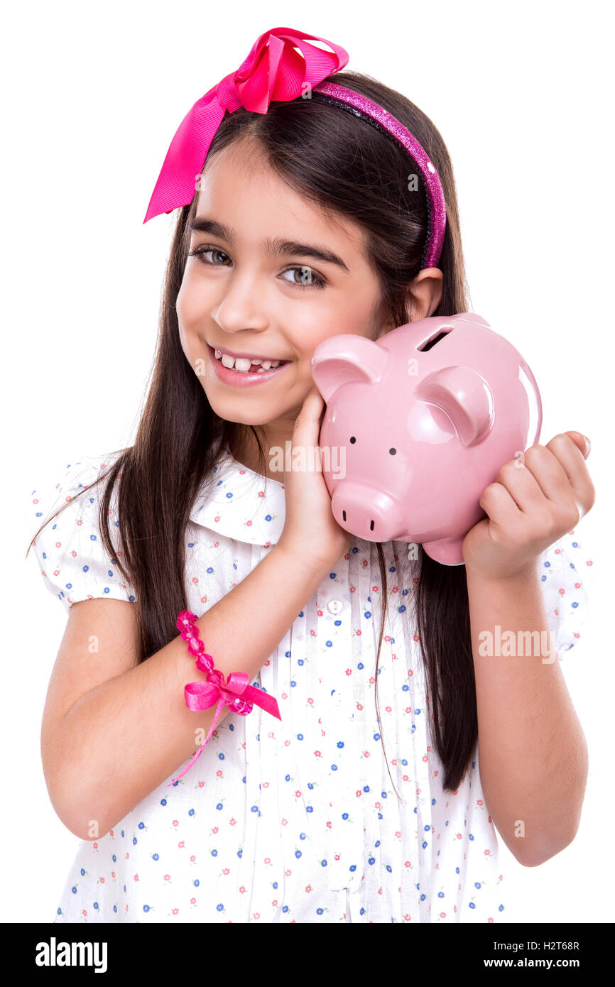 Girl holding a piggy bank Stock Photo - Alamy