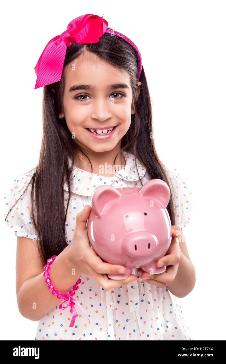 Girl holding a piggy bank Stock Photo - Alamy