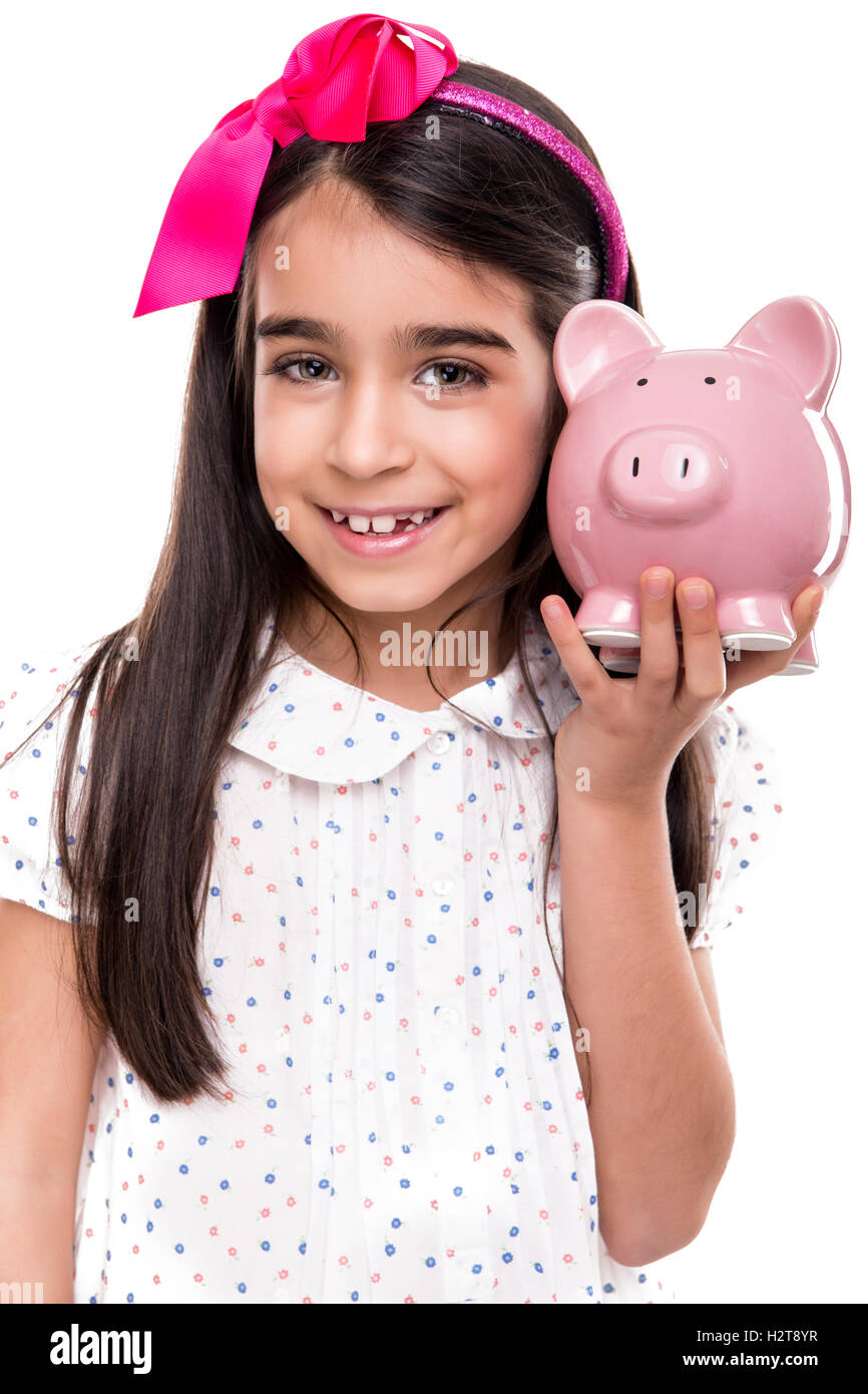 Girl holding a piggy bank Stock Photo - Alamy