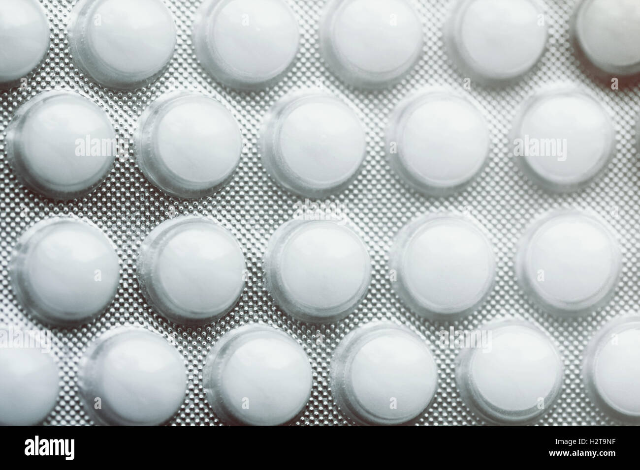 White round pills close up macro photo Stock Photo