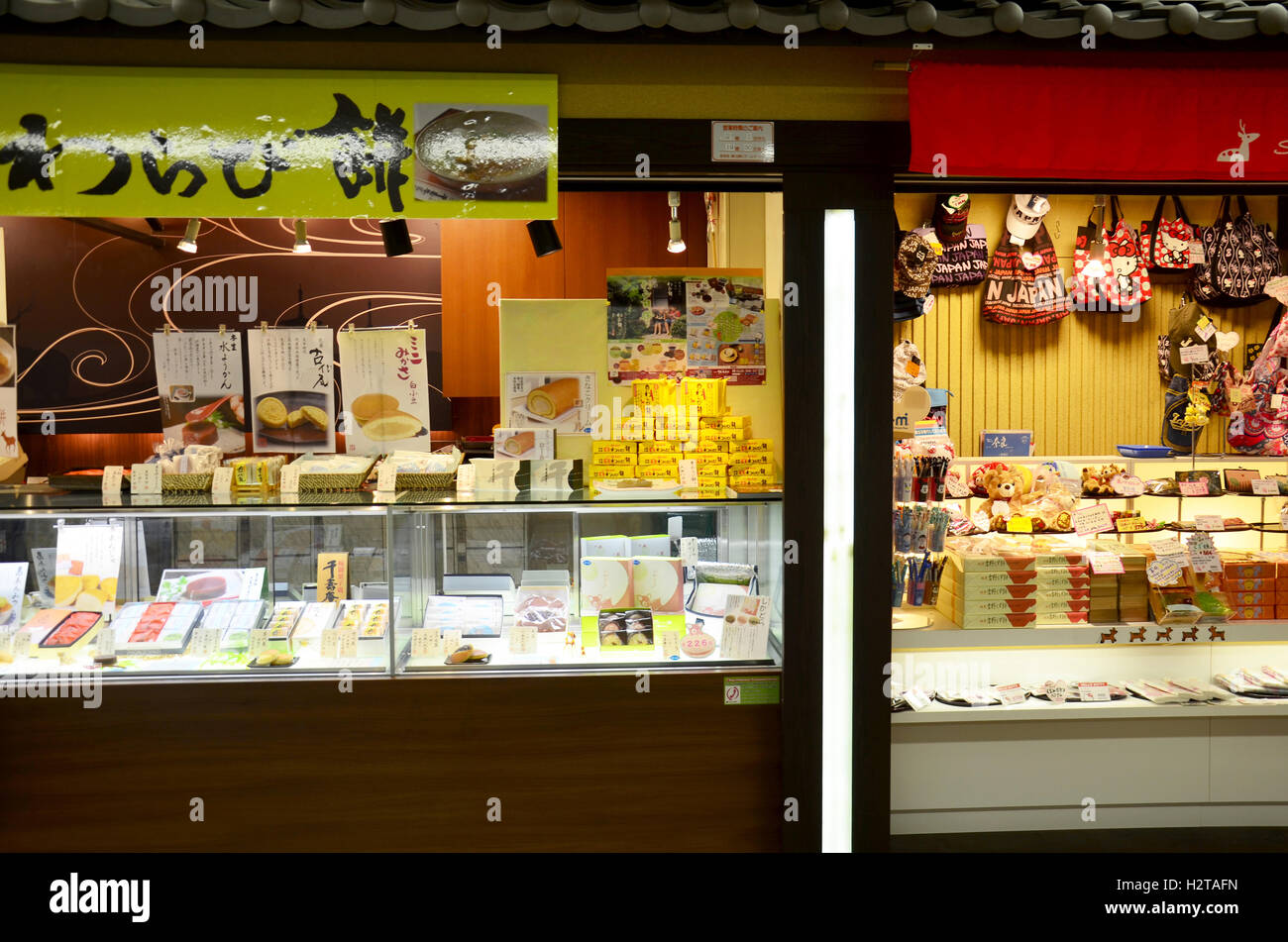 Food snacks and Souvenir gift shop for sale Japanese people and traveler foreigner in building of Subway train Kintetsu at Nara Stock Photo