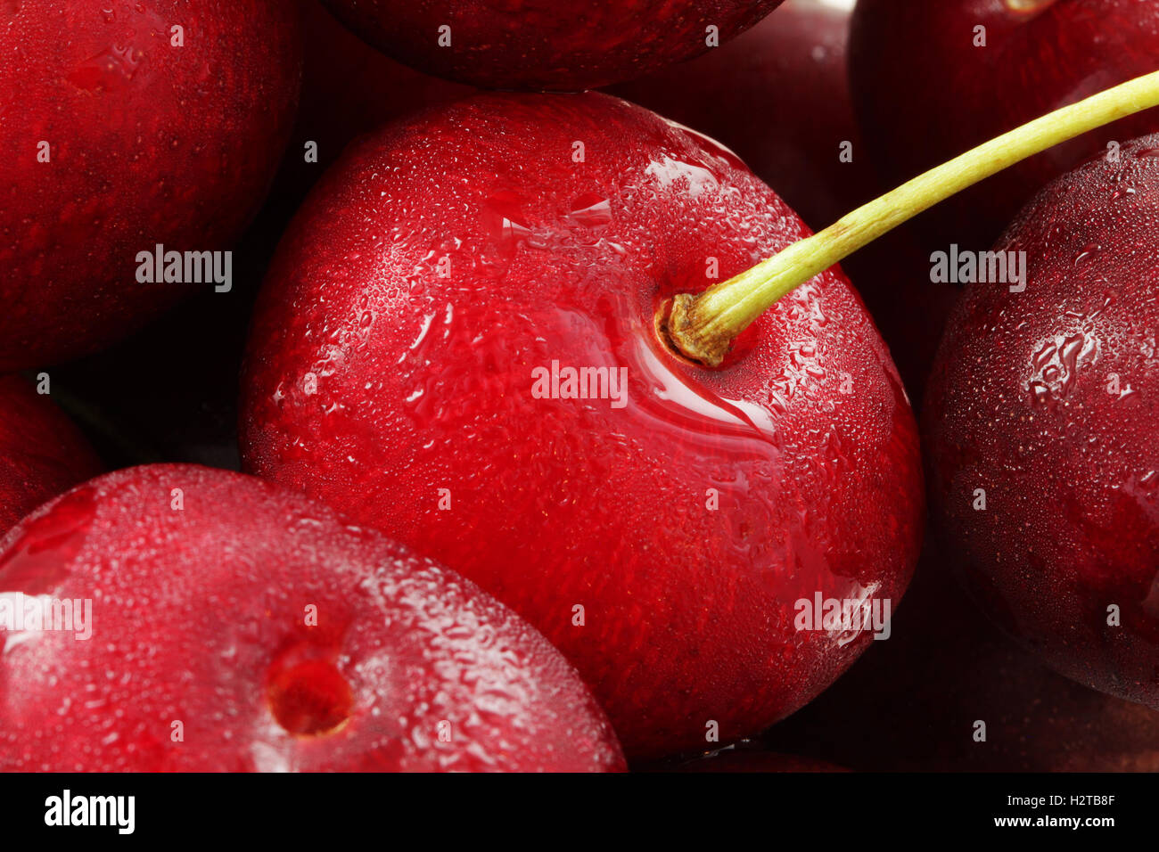 Beautiful red cherry close up macro photo Stock Photo - Alamy