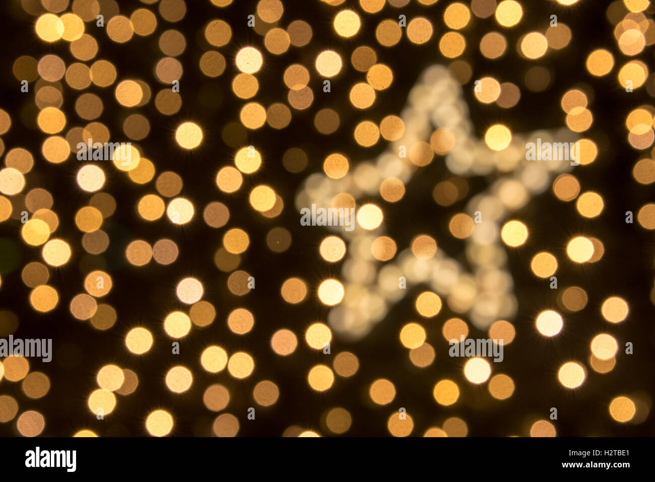 bokeh of christmas lights ans star Stock Photo