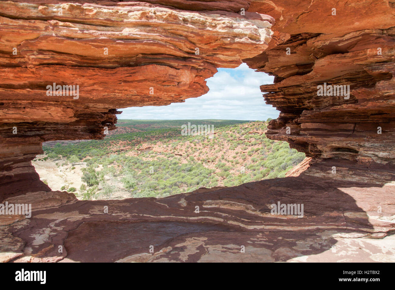 View through Nature's Window, natural arch, in the Kalbarri National Park overlooking the gorge in Kalbarri, Western Australia. Stock Photo