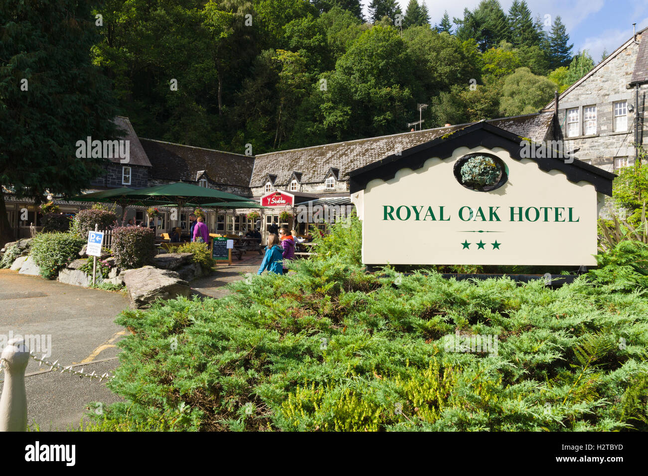 The Stables or Y Stablau beer garden and dining area at The Royal Oak Hotel in Betws y Coed Wales Stock Photo