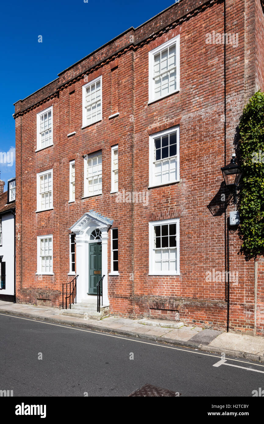 Attractive Georgian red brick house with front steps and sash windows, Lymington, Hampshire, UK Stock Photo