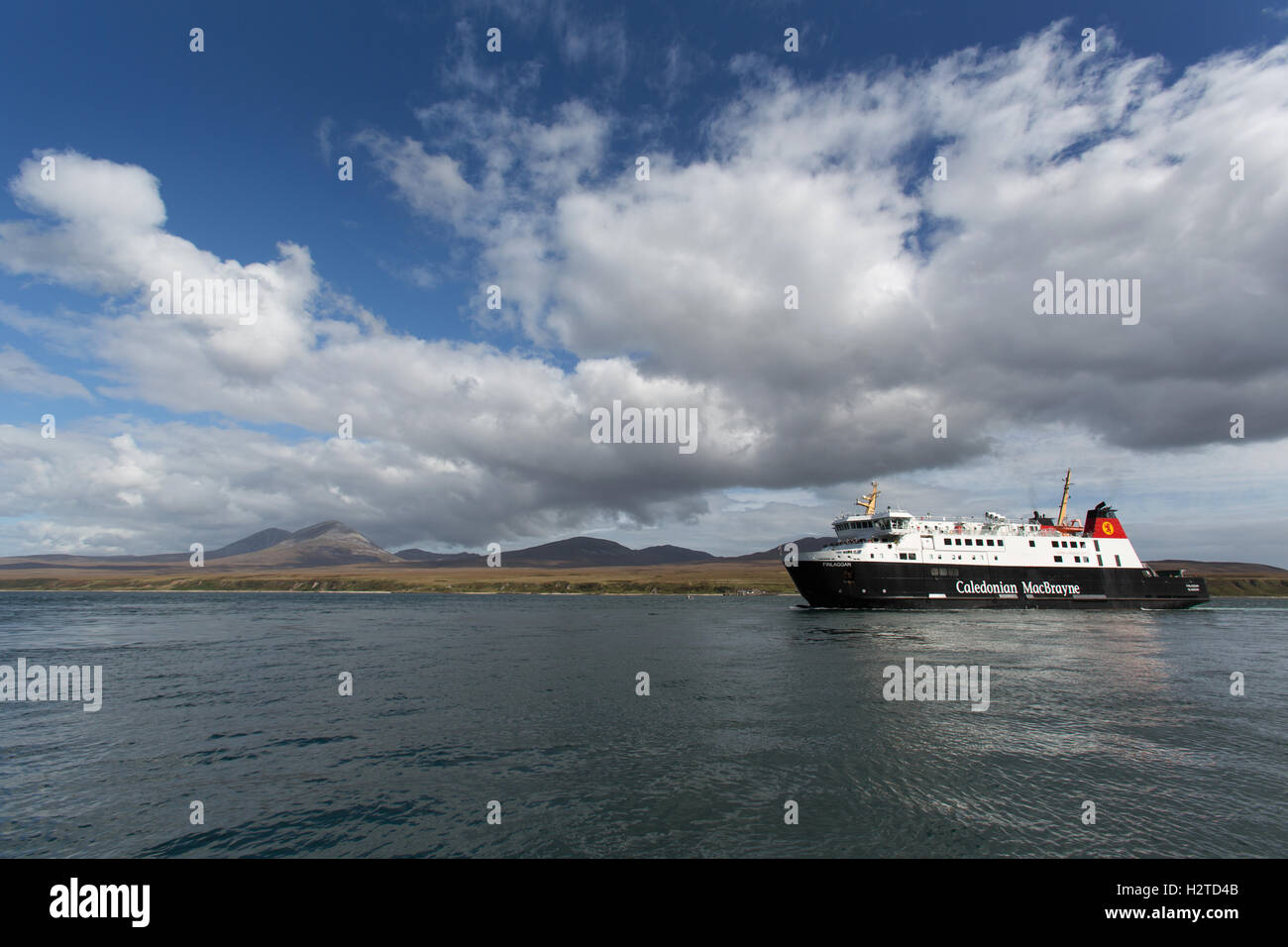 Isle of Islay, Scotland. The CalMac ferry MV Finlaggan transiting the Sound of Islay, with the