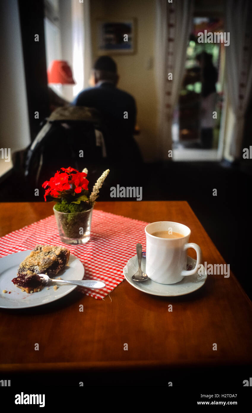 Coffee and cherry crumble in a bakery in Grainau Bavaria Germany Stock Photo
