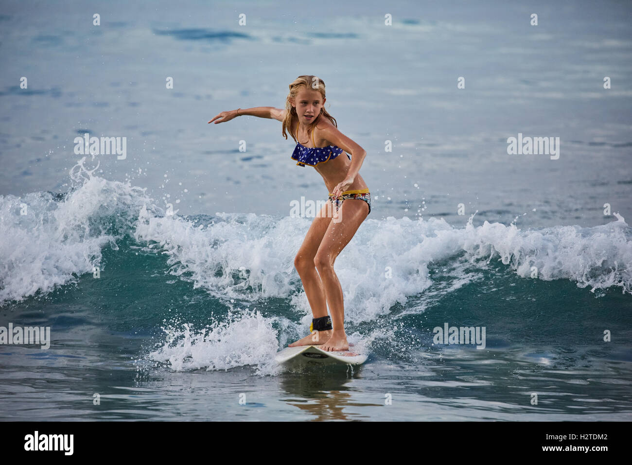 Barbados Bridgetown surfers pretty Young girl female teenagers surfing